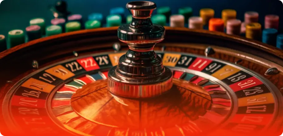 Roulette wheel and betting chips on the background